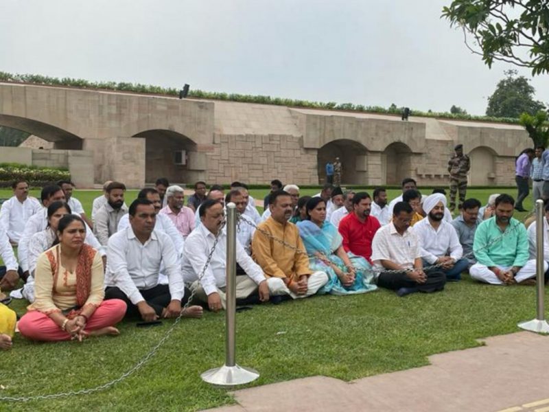 delhi bjp leaders purify rajghat with gangajal after aaps visit