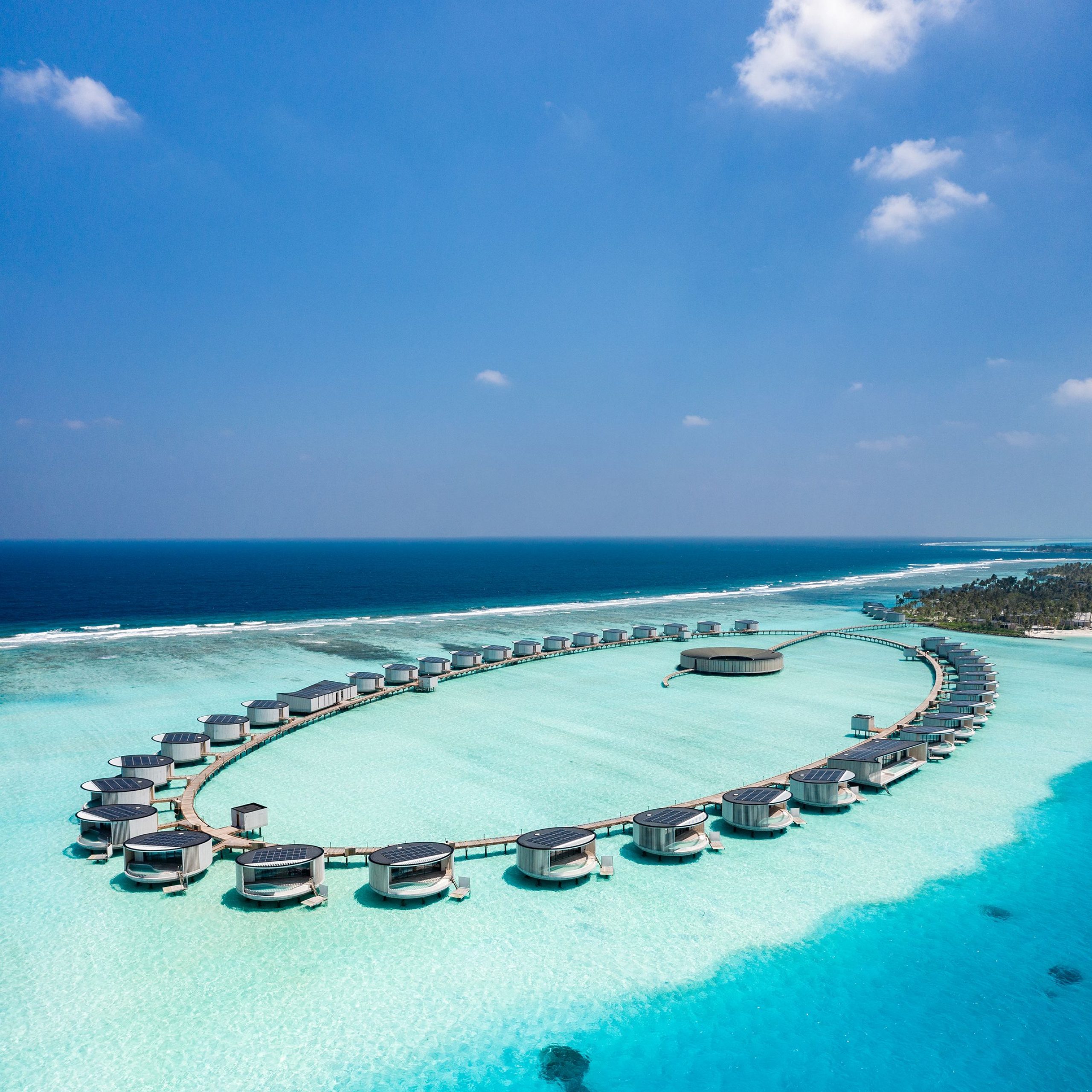 the ritz carlton maldives fari islands lagoon quay 1 1624209485