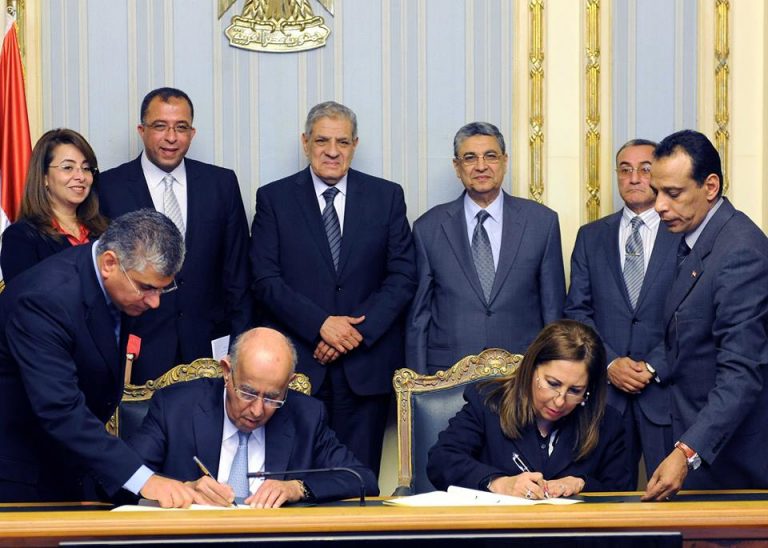 EgyptE28099s interim government signed two agreements with the Arab Fund for Economic and Social Development AFESD on Monday to finance projects in the electricity sector