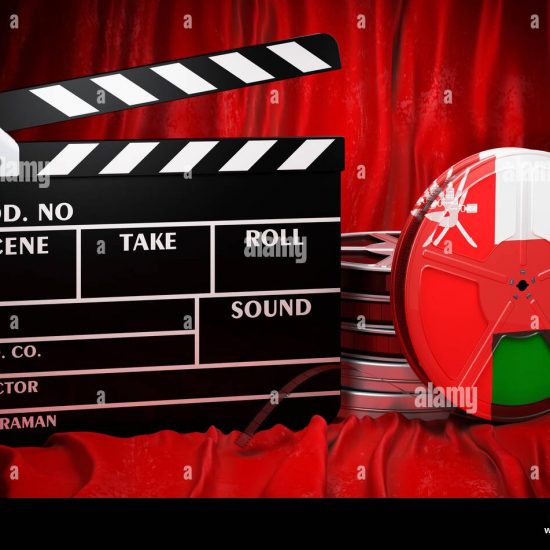 omani cinematography film industry cinema in oman concept clapperboard with and film reels on the red fabric 3d rendering 2JPTD2K
