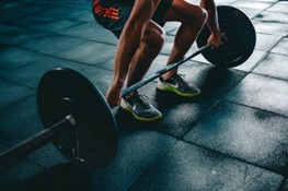 A man lifting a barbell